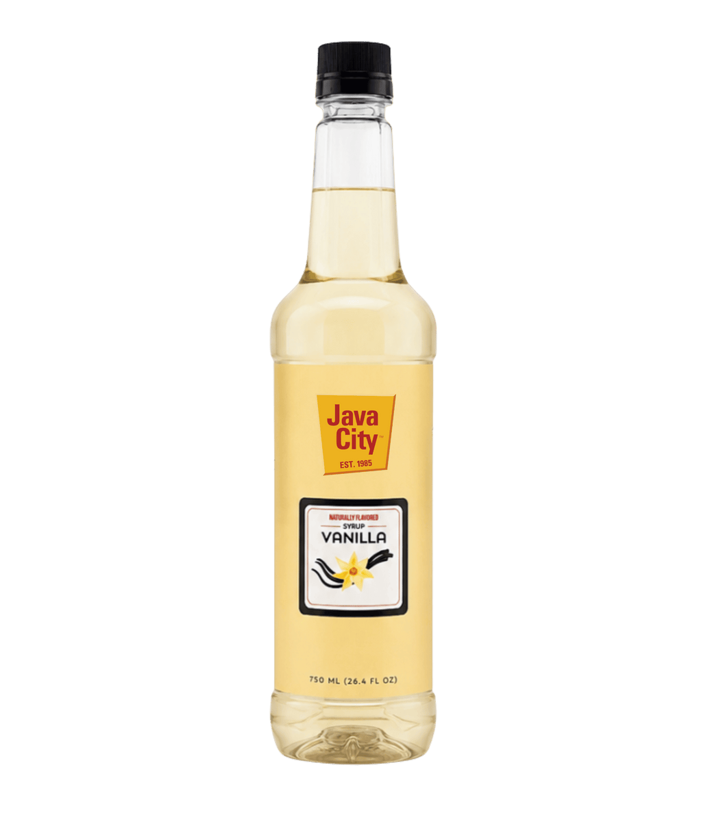 A bottle of Java City Vanilla Extract syrup on a solid dark green background. The clear bottle shows the pale yellow liquid inside, with a yellow and white label featuring vanilla bean illustrations and a black cap.