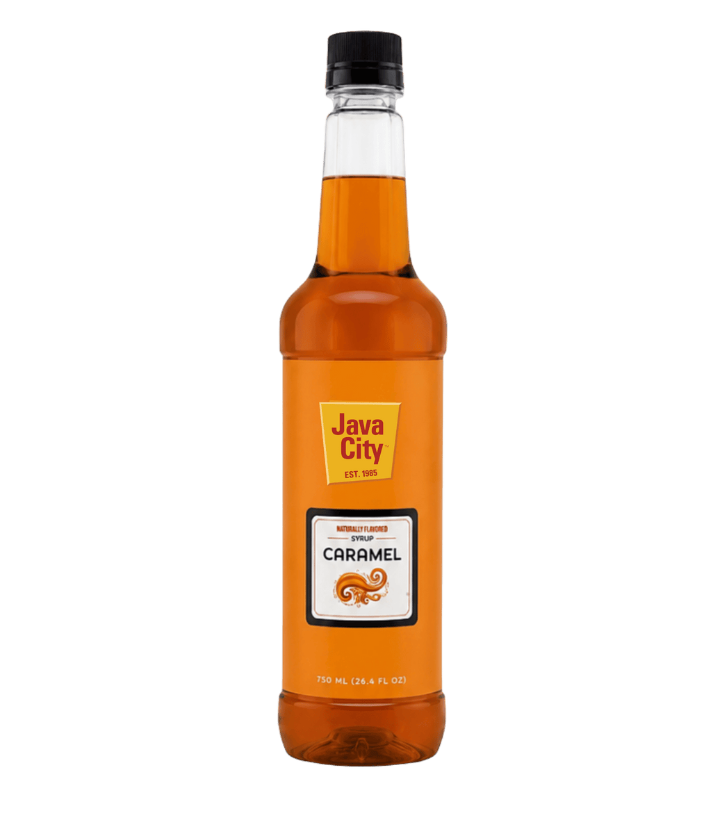 A bottle of Java City Caramel Syrup on a solid white background. The bottle is made of clear glass showing the amber-brown syrup inside, with a black screw cap and an orange label featuring the Java City logo and a caramel graphic.
