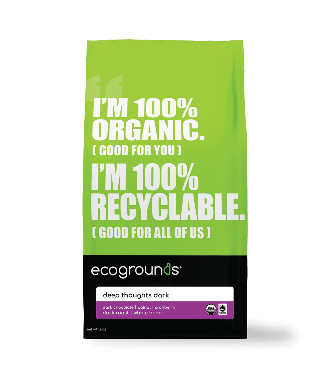Green coffee bag of Ecogrounds Deep Thoughts Dark with text about organic and recyclable qualities on a transparent background