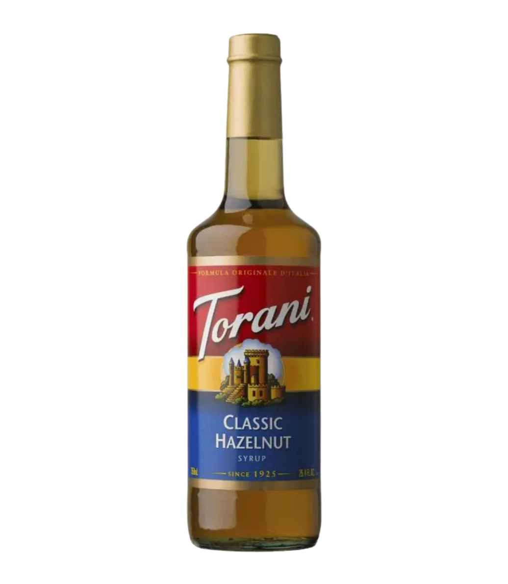 Torani Classic Hazelnut syrup bottle on a white background