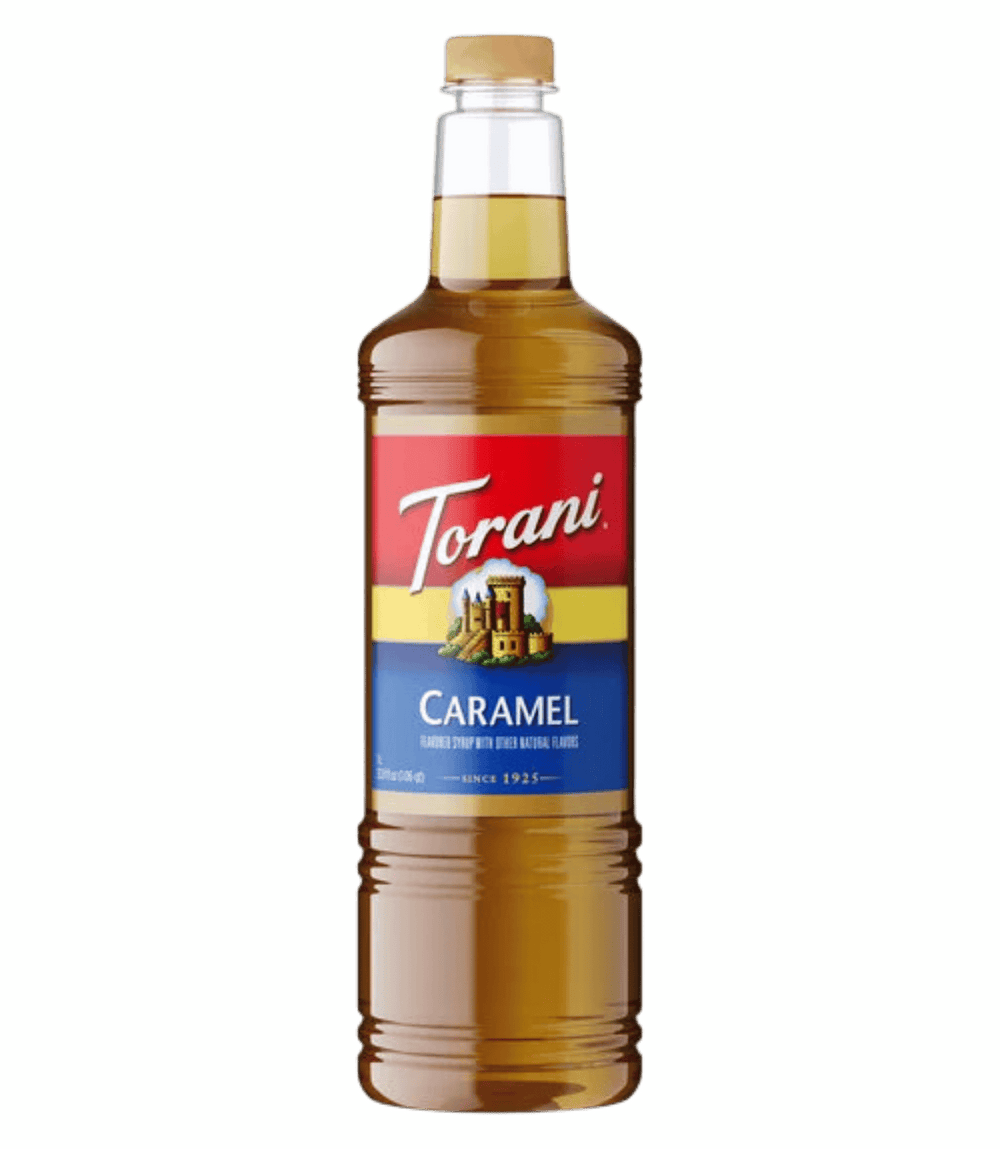 Torani Caramel syrup bottle on a white background