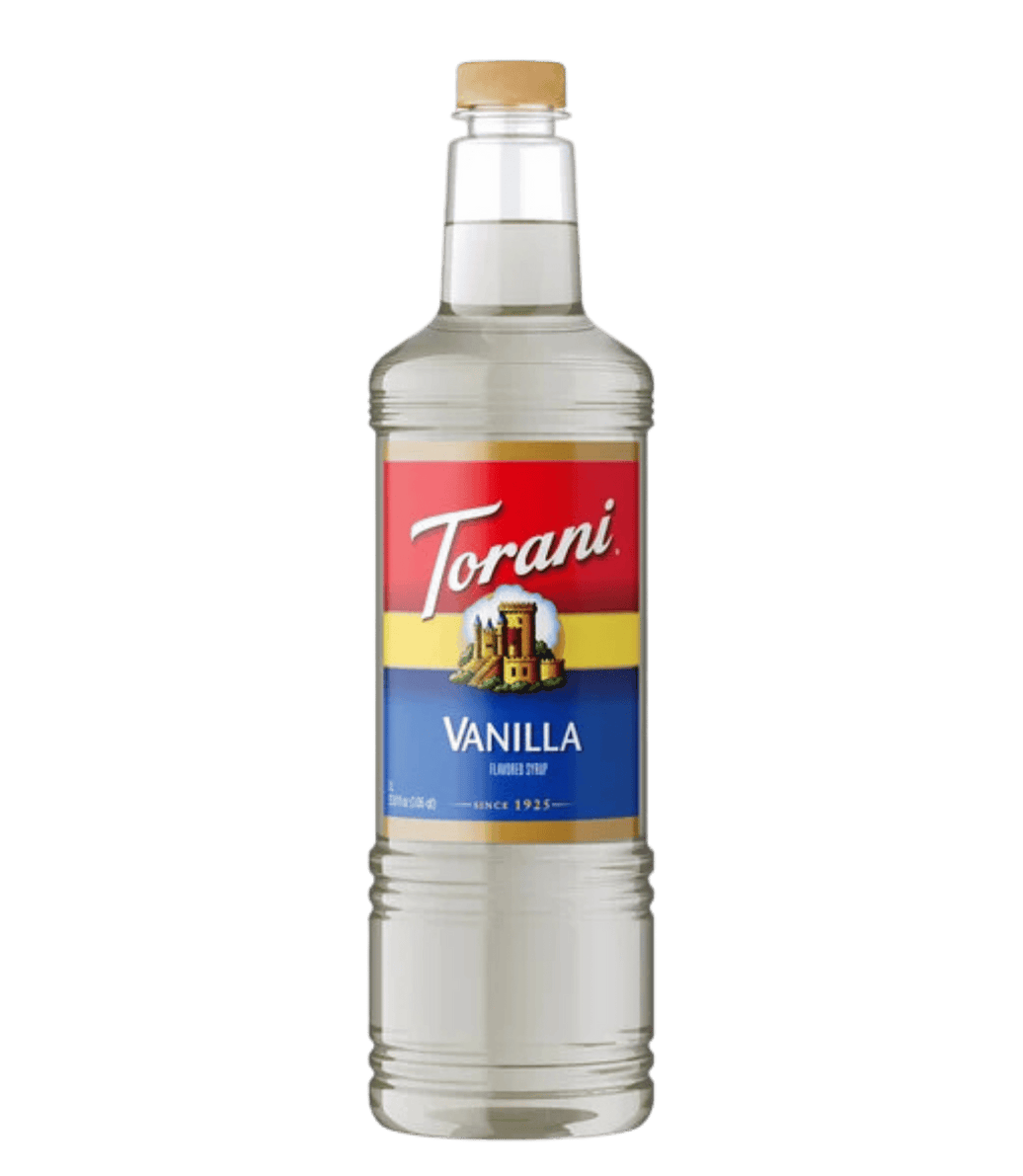 Torani Vanilla syrup bottle on a white background