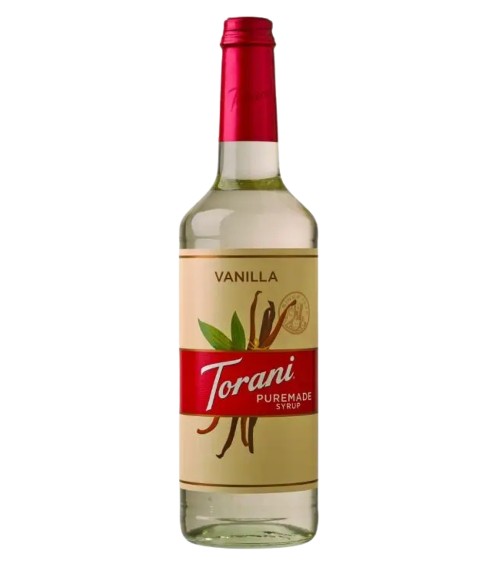 Bottle of Torani Puremade Vanilla syrup on a white background
